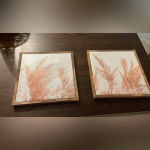 Two small wooden canvases
